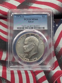 1976-S 40% silver Eisenhower $1. Slabbed by PCGS, top grader, as MS 66. A white blazer.