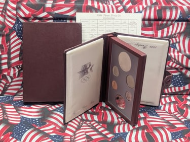 1984-S U.S. Mint Prestige Set in OGP w/ COA - Includes Olympic Coliseum Commemorative Silver Dollar.