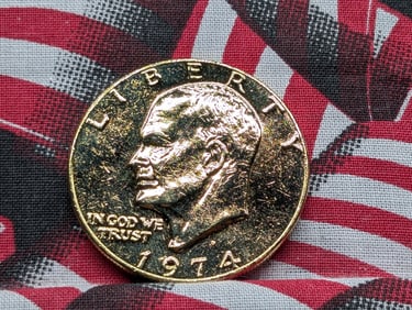 Gold *LAYERED* 1974-D Eisenhower Dollar.