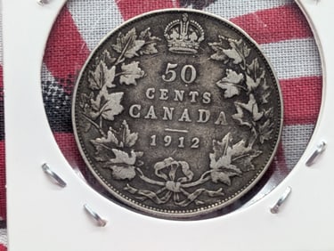 1912 Canada 50 Cent, 92.5% Silver, 11.62 Grams.
