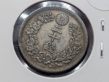 Year 37 = Meiji 1904 Japanese 20 Sen silver coin from the Meiji era. 80% Silver, 5.39 Grams.