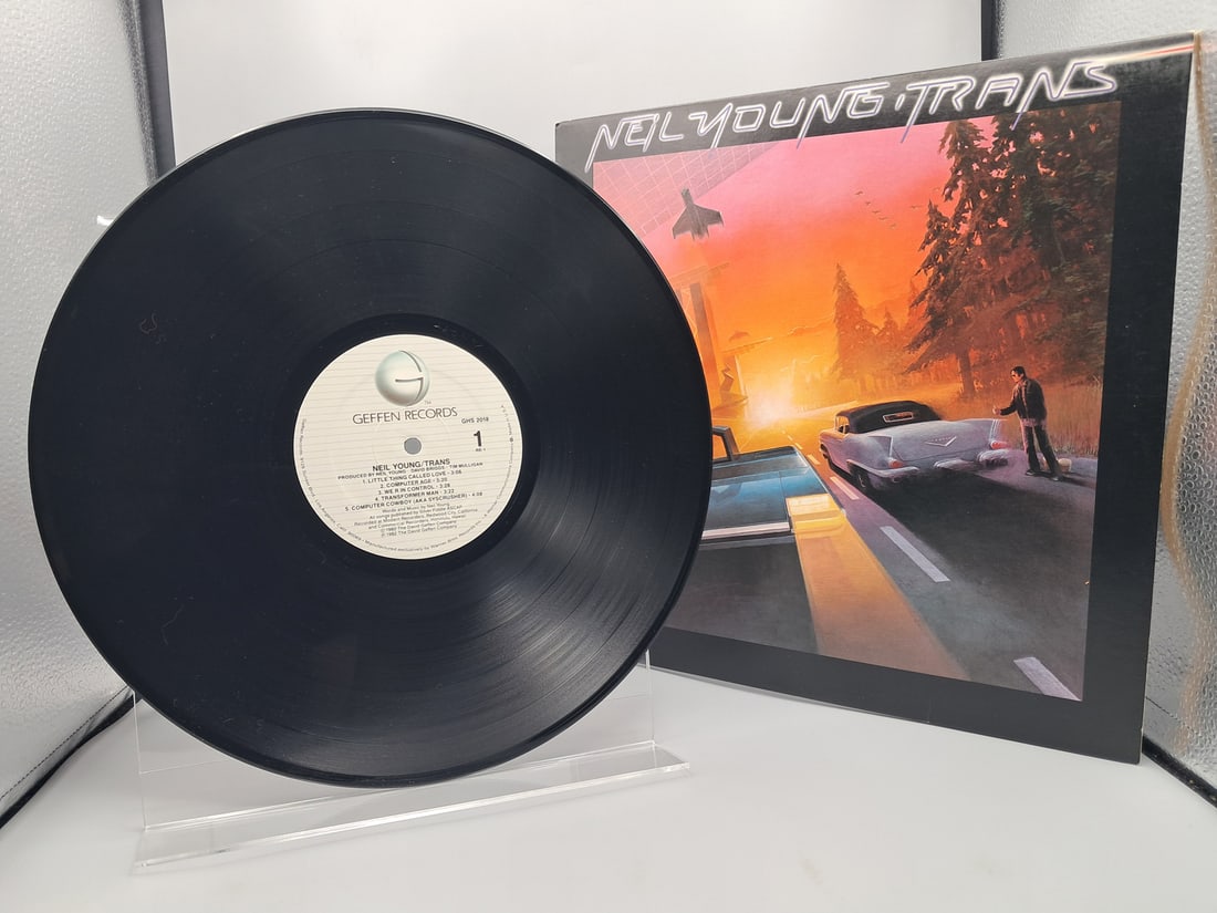 1982 Neil Young Trans Vinyl Album - GHS 2018: 1982 Neil Young Trans Vinyl Album - GHS 2018 - Records have not been tested by the auction house for play quality. All items are sold as is.