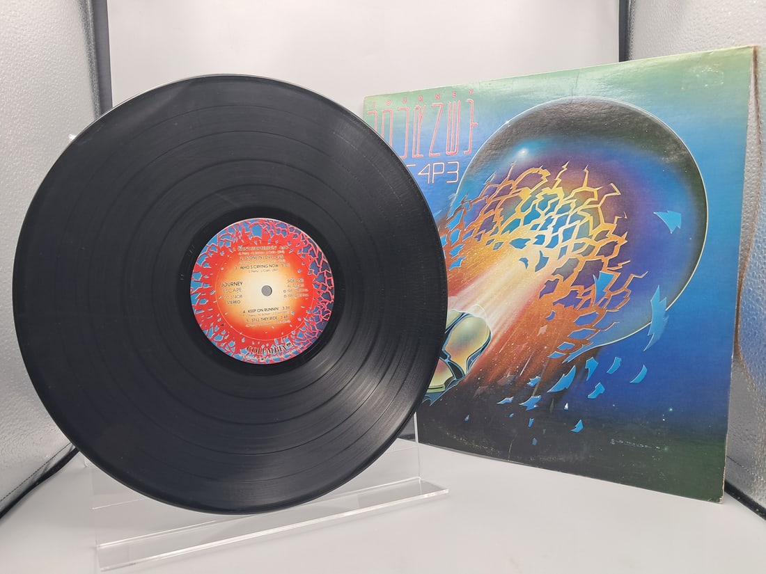 1981 Journey Escape Vinyl Album - TC 37408: 1981 Journey Escape Vinyl Album - TC 37408 - Records have not been tested by the auction house for play quality. All items are sold as is.