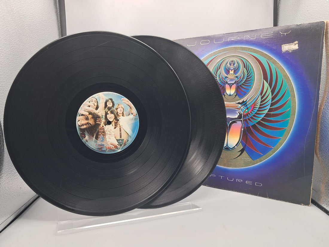 1981 Journey Captured Vinyl Album - KC2 37016: 1981 Journey Captured Vinyl Album - KC2 37016 - Records have not been tested by the auction house for play quality. All items are sold as is.
