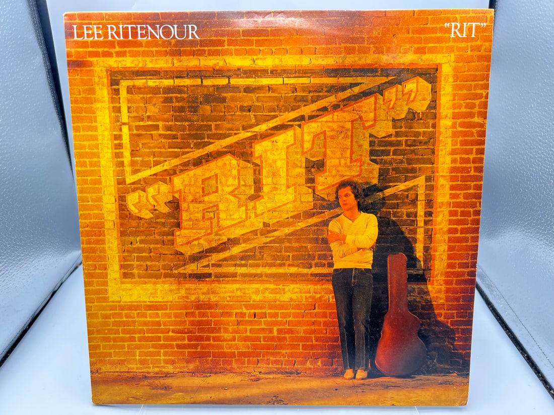 1981 Lee Ritenour Rit Vinyl Album - 6E-331: 1981 Lee Ritenour Rit Vinyl Album - 6E-331 - Records are untested by auction house for play quality. All items are sold as is.