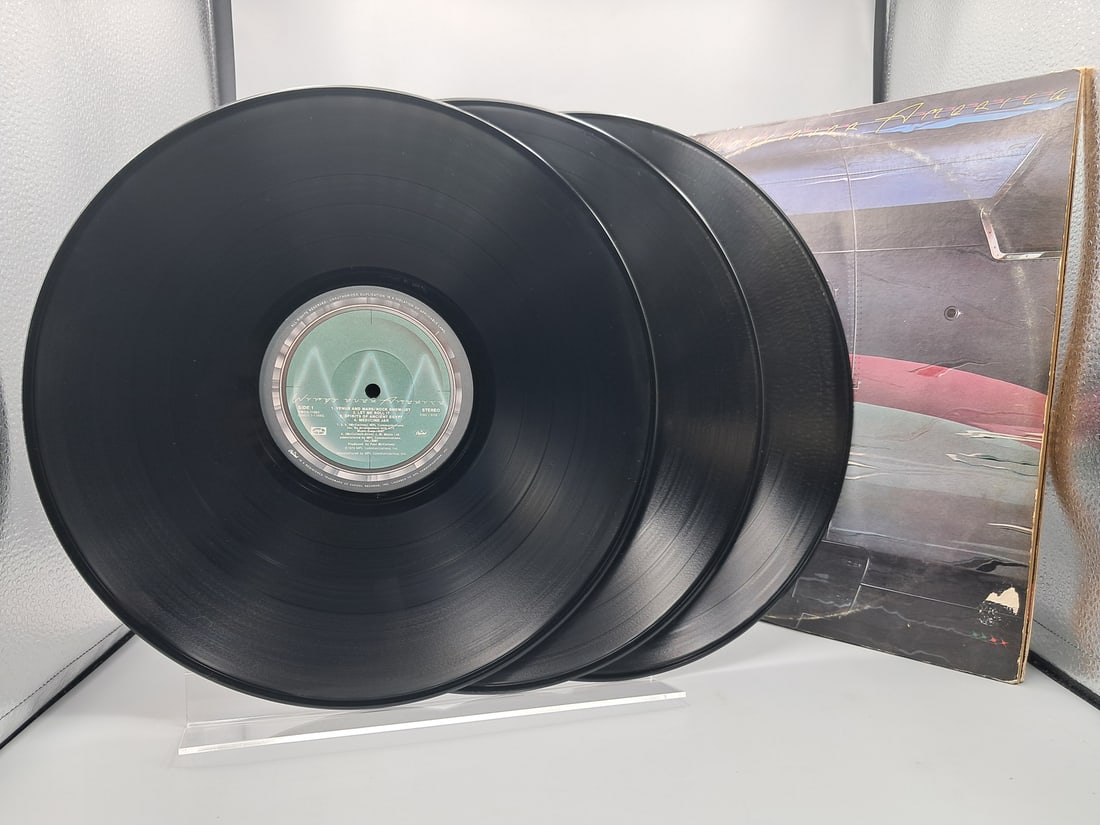 1976 Wings Over America Vinyl Album - SWCO-11593: 1976 Wings Over America Vinyl Album - SWCO-11593 - Records have not been tested by the auction house for play quality. All items are sold as is.