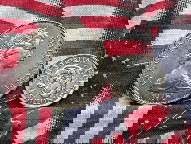1943 Australia 1 92.5% Silver Shilling 5.65 grams & 1976 Isle of Man 1 Crown 