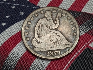 *VG+* 1877 w/ Motto Seated Liberty Half Dollar