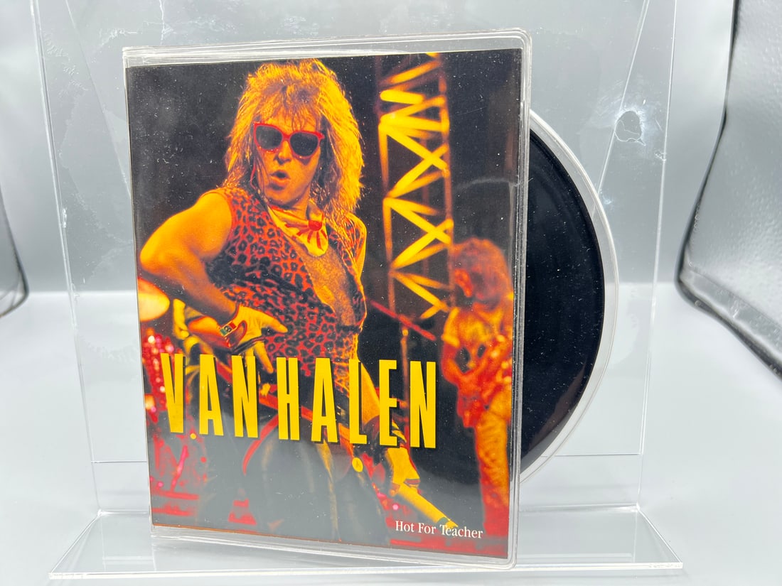 1984 Van Halen Hot For Teacher/Little Dreamer 45 RPM Record - 7-29199: 1984 Van Halen Hot For Teacher/Little Dreamer 45 RPM Record - 7-29199 - Records are untested by auction house for play quality. All items are sold as is.