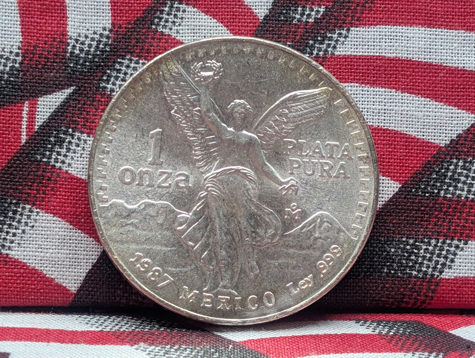1987 Mexico 1 Silver Onza Libertad: .999 Weight: 31.1g *KEY DATE - GEM BU*: 1987 Mexico 1 Silver Onza Libertad: .999 Weight: 31.1g *KEY DATE - GEM BU*