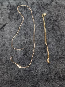 Two 14kt Gold Italy Broken Chains. 2.8 grams