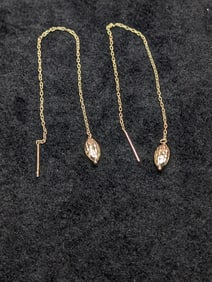 14kt yellow Gold Earrings. 0.7 grams.