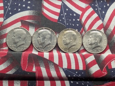 (4) Kennedy Half Dollars  1976 P & D, 1977-P, 1979-P
