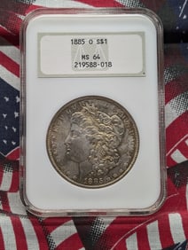 1885-O Morgan Dollar Toned NGC MS64 Early Slab - Upgrade Potential