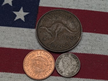1907 Panama 1/2 Centesimo, 1942 Australia Penny, & 1964 Sierra Leone Half Cent,