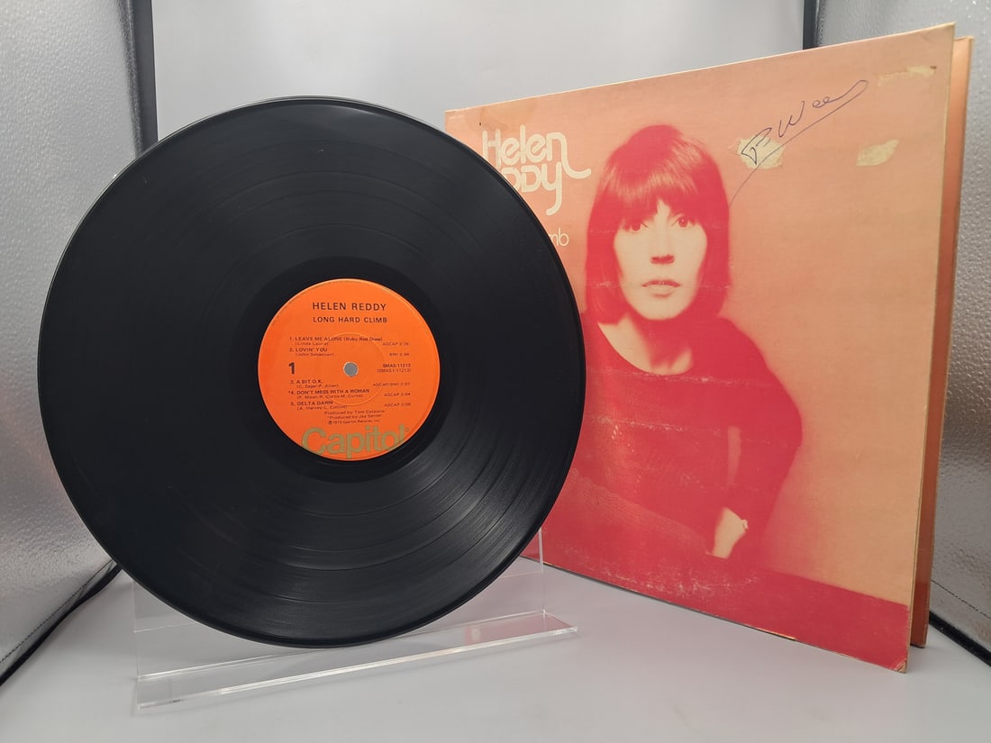 1973 Helen Reddy Long Hard Climb Vinyl Album - SMAS-11213: 1973 Helen Reddy Long Hard Climb Vinyl Album - SMAS-11213 - Records are untested by auction house for play quality. All items are sold as is.