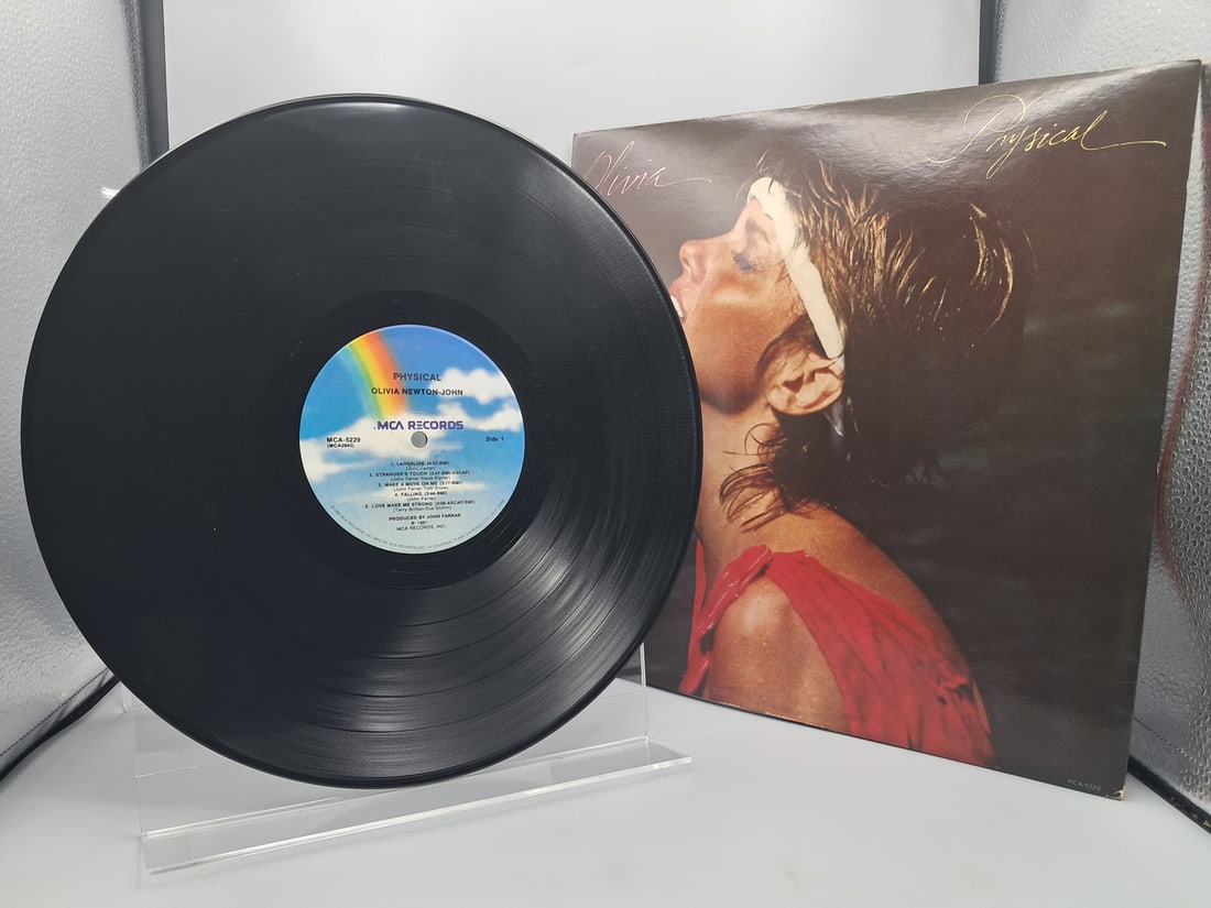 1981 Olivia Newton-John Physical Vinyl Album - MCA-5229: 1981 Olivia Newton-John Physical Vinyl Album - MCA-5229 - Records are untested by auction house for play quality. All items are sold as is.