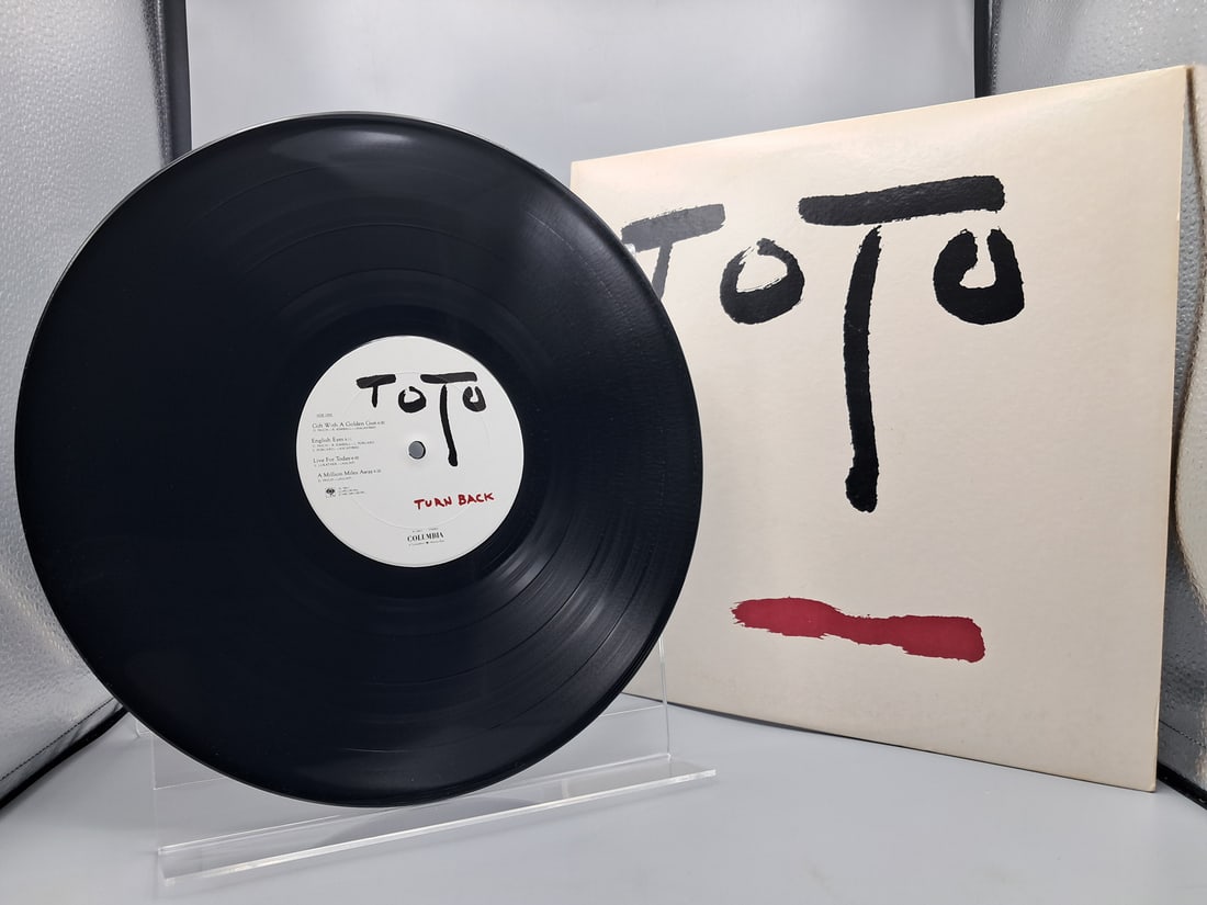 1981 Toto Turn Back Vinyl Album - FC 36813: 1981 Toto Turn Back Vinyl Album - FC 36813 - Records are untested by auction house for play quality. All items are sold as is.