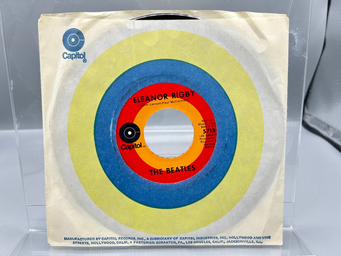 1960s The Beatles Yellow Submarine/Eleanor Rigby Reissue 45 RPM Record - 5715: 1960s The Beatles Yellow Submarine/Eleanor Rigby Reissue 45 RPM Record - 5715 - Records untested by auction house for play quality. All items are sold as is.