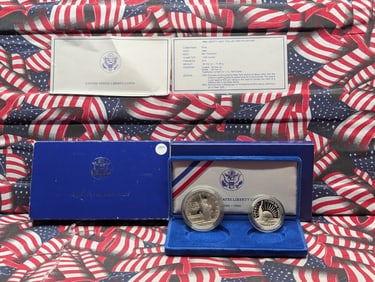 1986-S Liberty Silver Dollar & Clad Liberty Half Dollar In OGP With COA