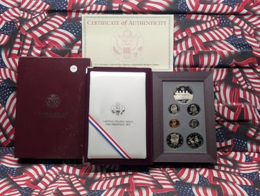 1996-P & S Prestige Proof Set. Regular coins plus Olympic 90% Silver Dollar (Rowing). Nice box and