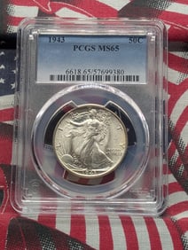 1943 Walking Liberty Half Dollar. Slabbed as MS 65 by PCGS, top grader. Pure white coin. 90% Silver
