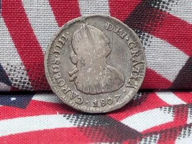 1807 Chile 1 Reale. 90% silver. Probably circulated in the early US. Hard to find.