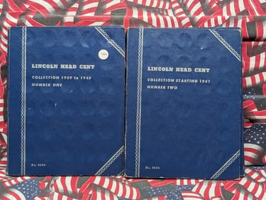 2 Lincoln Cent Folders. 29 coins from 1909 to 40 and complete from 1941 to -58 D and 12 Memorials.