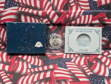 1982-D Washington Commemorative Half Dollar. GEM BU in original box plus COA. Books For $150 MS69