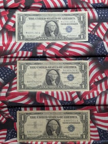 1957, 1957-A, & 1957-B $1 Blue Seal Silver Certificates. Bust Of George Washington. 3 Notes.