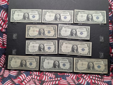 (1) 1935-F, (1) 35-H, (6) 57, (1) 57-A, (1) 57-B Series $1.00 Silver Certificates