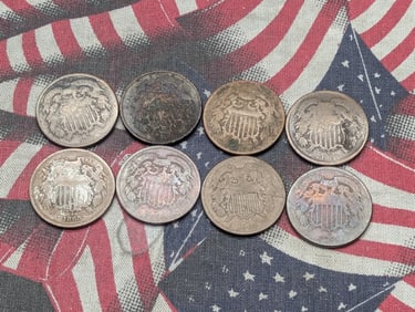 8 - Cull Two Cent Shield Coins.