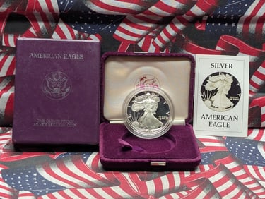 1986-S Silver American Eagle in OGP w/ COA - One Troy Ounce .999 Fine Silver
