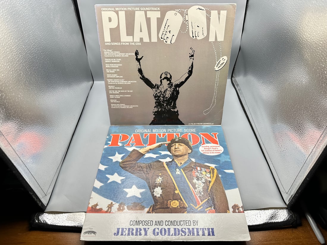 2 LP Soundtrack Lot: Platoon (1987); and Patton (1983), reissue: 2 LP Soundtrack Lot: Platoon (1987); and Patton (1983), reissue - Records are untested by auction house for play quality. All items are sold as is.