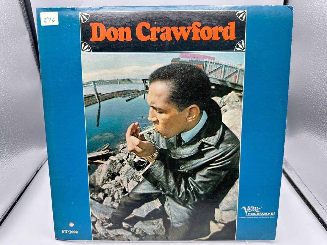 Don Crawford: Self-titled (1966), promo hole in cover: Don Crawford: Self-titled (1966), promo hole in cover - Records are untested by auction house for play quality. All items are sold as is.