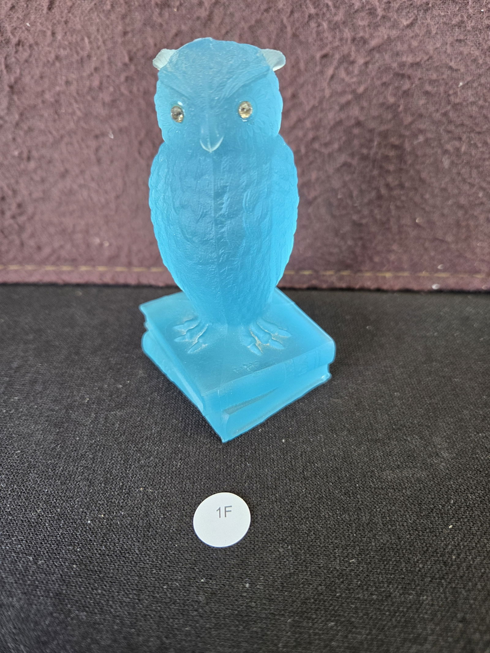 Vintage Degenhart Glass Opaque Blue Wise Owl on Books Figurine: A vintage Degenhart Glass 'Wise Owl on Books' figurine, commonly referred to as 'Opaque Blue' or 'Slag Blue' in the collector's market. This charming piece features a translucent, frosted light blue g