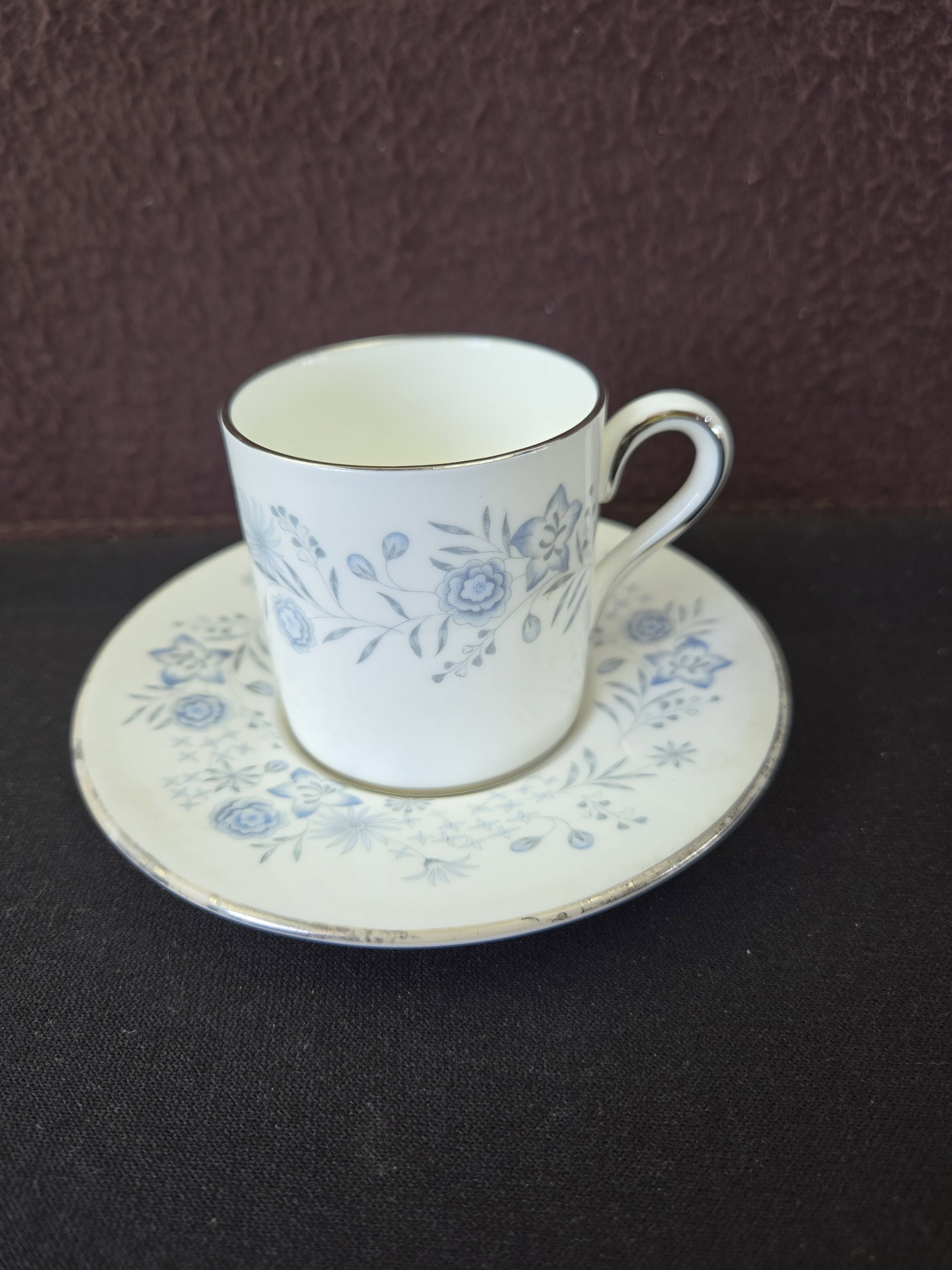 1960s Wedgwood Belle Fleur R4356 Bond Shape Bone China Demitasse Cup & Saucer Set: This listing features a classic Wedgwood 'Belle Fleur' R4356 Bond Shape demitasse cup and saucer set. Crafted from fine white bone china, the set showcases a delicate blue floral pattern, characterist