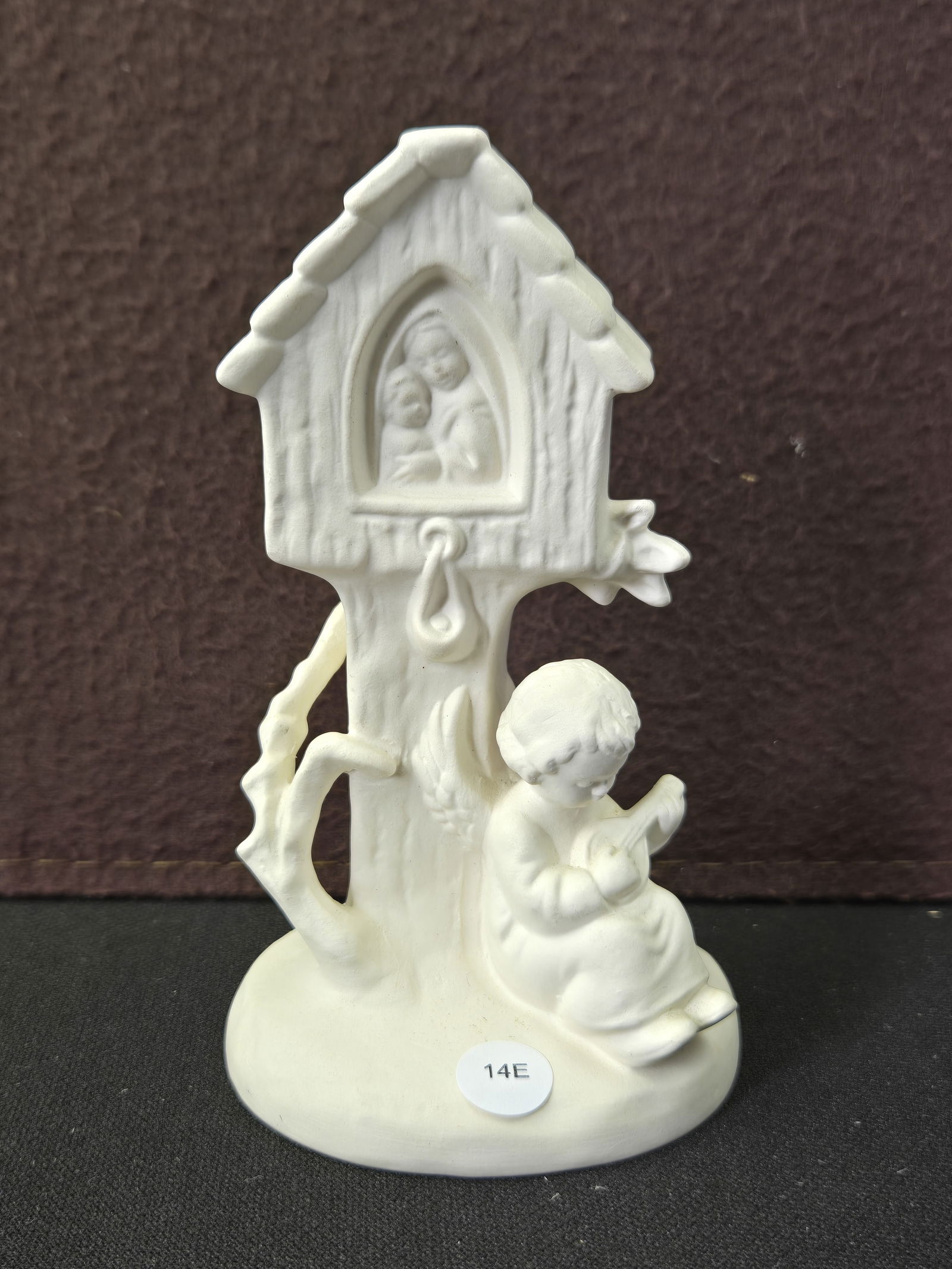 Goebel M.I. Hummel W. Germany White Bisque Angel & Madonna Child Tree Shrine Figurine: This is an authentic Goebel M.I. Hummel white bisque porcelain figurine, produced in West Germany between 1949 and 1990, as indicated by the "Goebel W Germany" blue stamp and engraved "M.I. Hummel" si
