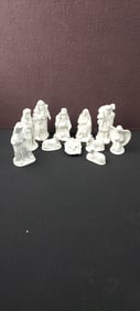 A Collection of Eleven Vintage White Porcelain Nativity Figurines with Gold Accents