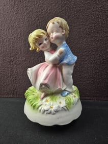 Vintage Japanese Ceramic and Porcelain Boy and Girl Rotating Music Box