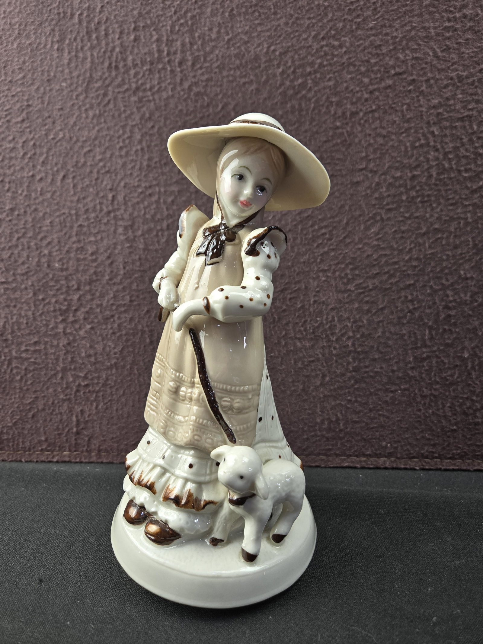 Vintage Price Products Bellmawr N. J. Taiwan Mary Had A Little Lamb Porcelain Musical Figurine: A Vintage Price Products Bellmawr N. J. Taiwan 'Mary Had A Little Lamb' Porcelain Musical Figurine. This charming porcelain or ceramic figurine depicts a young woman, often associated with Mary from t