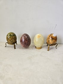 A Lot of Four Polished Decorative Stone Eggs, including Italian Alabaster and Mexican Stone