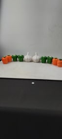A Collection of Ceramic Vegetable-Themed Salt and Pepper Shakers, comprising Carrot, Bell Pepper,