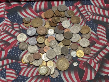 16 Ounces Plus of Unsearched Foreign Coins.