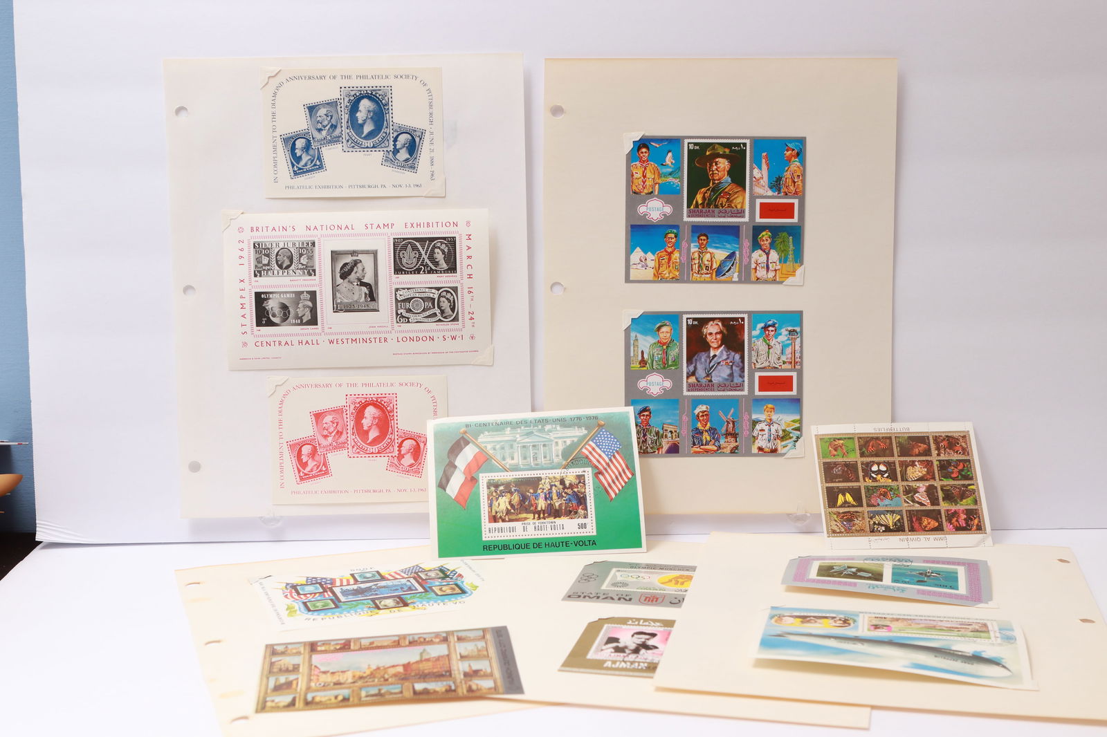 Worldwide stamp lot including Britain’s STAMPEX souvenir sheets, colorful topical sets (1 of 14)