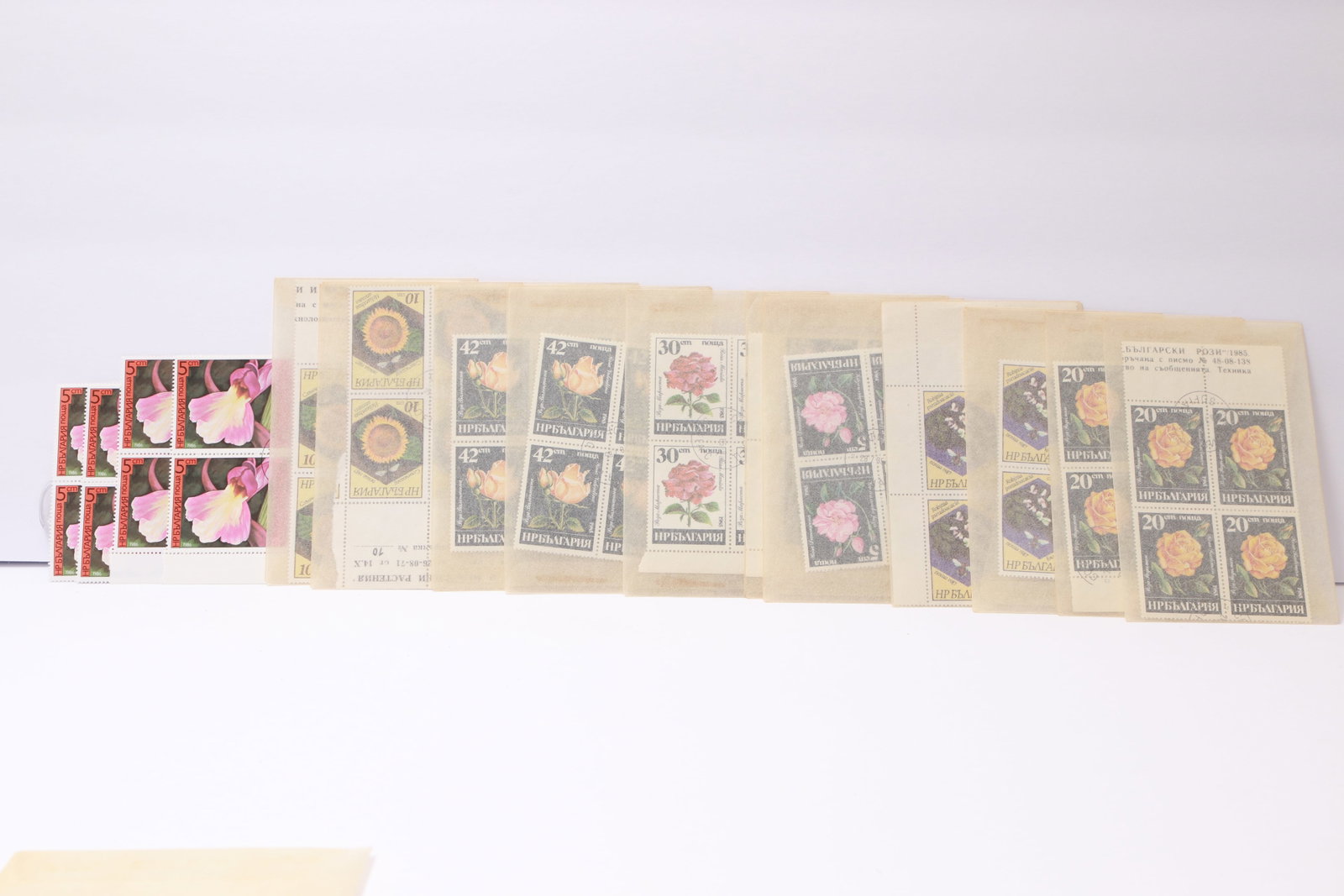 Bulgaria Floral Stamp Blocks: This lot consists of Bulgarian stamp blocks, each featuring floral motifs. The group includes lilies-of-the-valley (30 st., multiple blocks), roses in several denominations (20 st., 30 st., and 42 st.