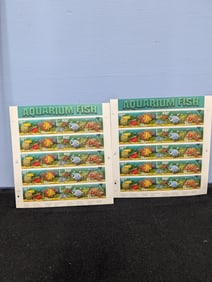 Two full sheets of U.S. Aquarium Fish 33 cent stamps.