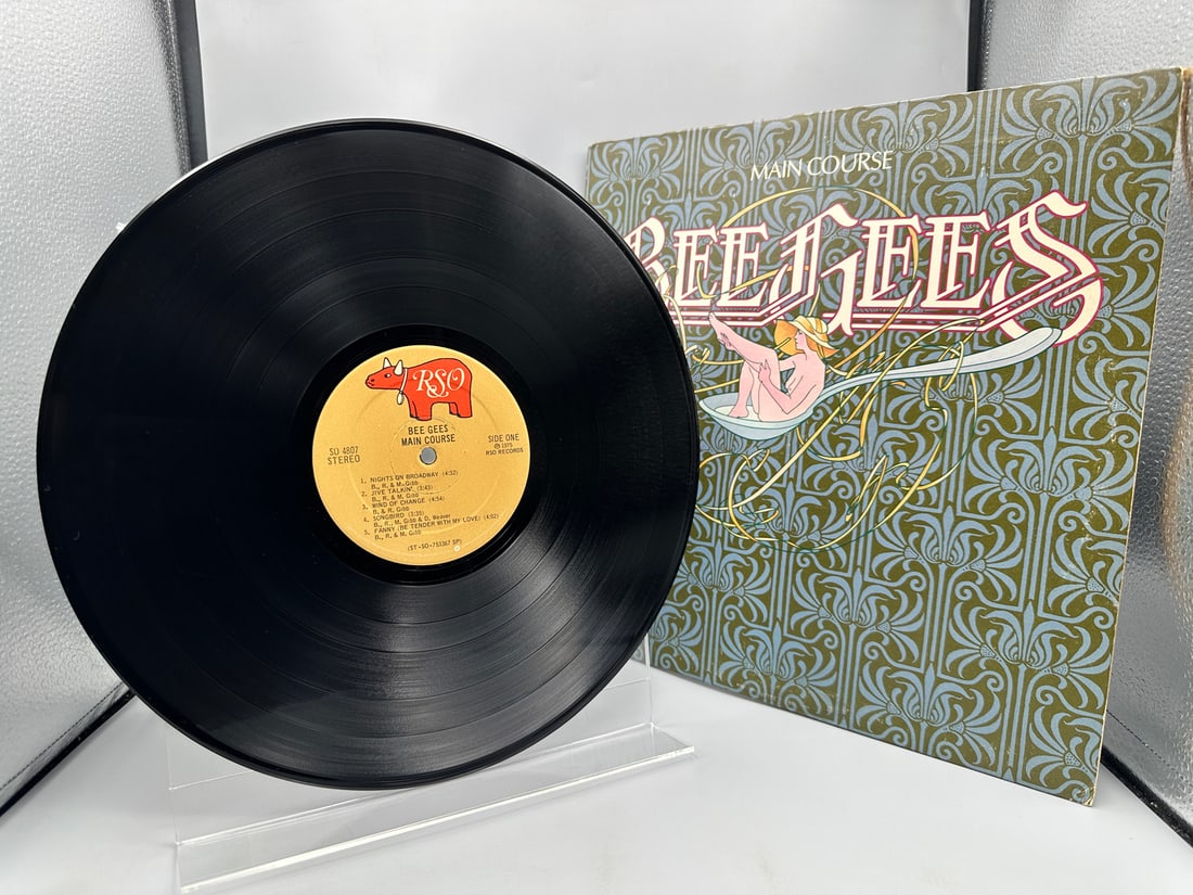 1975 The Bee Gees Main Course Vinyl Album - SO 4807: 1975 The Bee Gees Main Course Vinyl Album - SO 4807 - Records are not tested by auction house for play quality. All items are sold as is.