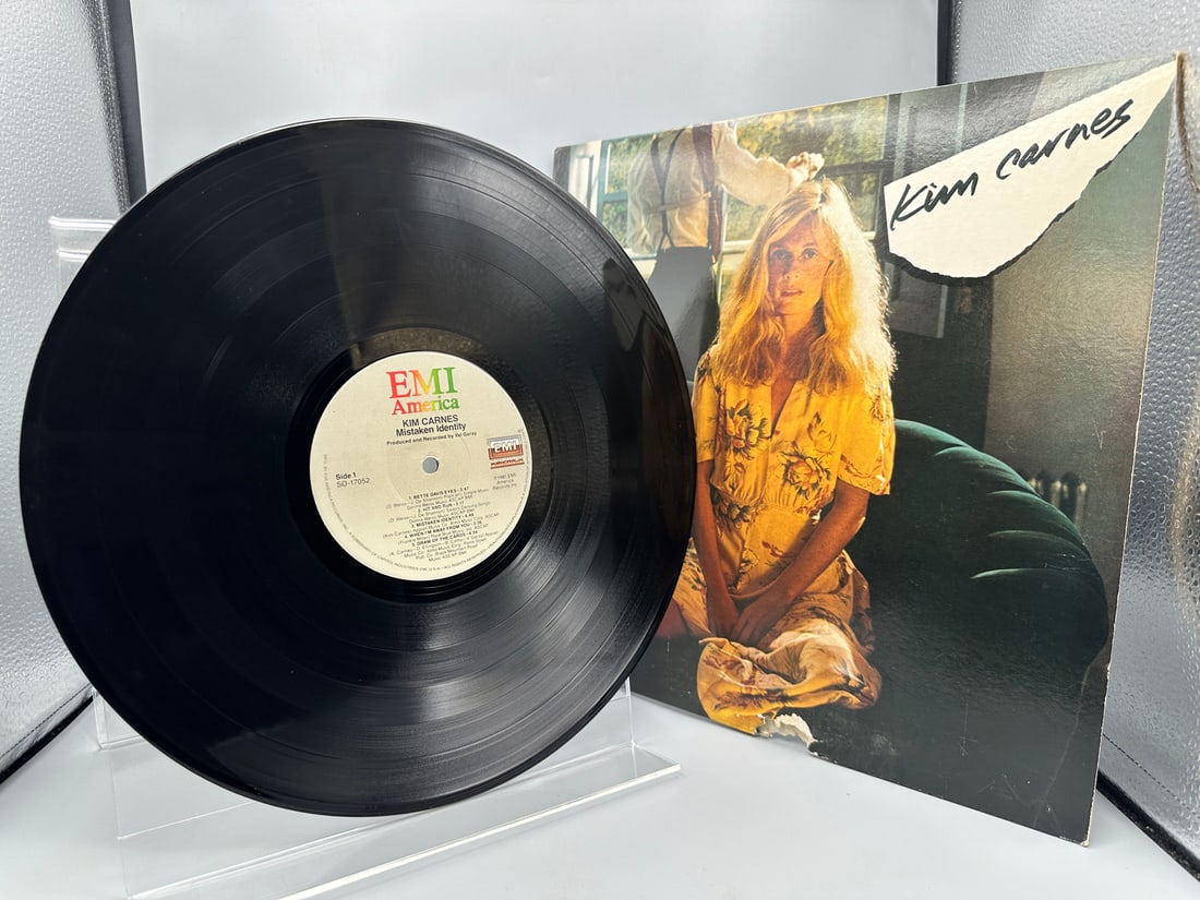 1981 Kim Carnes Mistaken Identity Vinyl Album - SO-17052: 1981 Kim Carnes Mistaken Identity Vinyl Album - SO-17052 - Records are not tested by auction house for play quality. All items are sold as is.