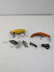 A Collection of Six Vintage Fred Arbogast Jitterbug and Assorted Fishing Lures
